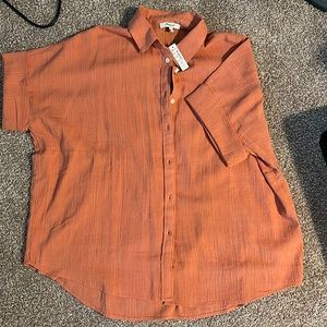 Brand new button down blouse in Salmon color brand new